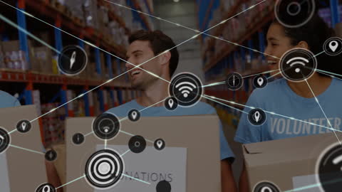 Volunteers in Warehouse Connected Through Global Network Concept