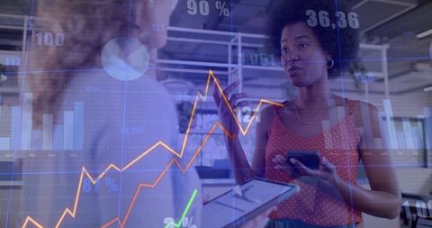 Diverse Professionals Engaging in Financial Data Analysis with Charts