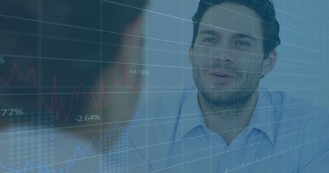 Financial Data Overlay with Businessmen Shaking Hands in Meeting