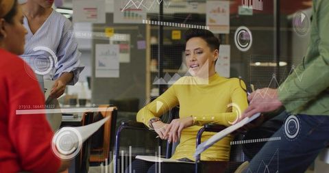 Team Analyzing Data and Collaborating in Modern Office Setting