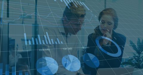 Coworkers Analyzing Digital Data with Overlayed Graphs in Modern Office - Download Free Stock Images Pikwizard.com
