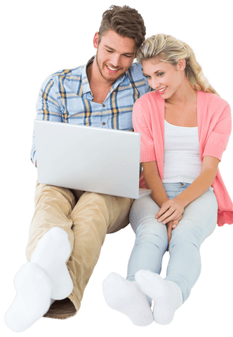 Cheerful Couple Sitting Relaxed Using Transparent Screened Laptop at Home - Download Free Stock Videos Pikwizard.com