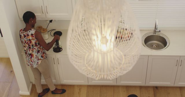 Overhead View of Woman Preparing Meal in Modern Kitchen - Download Free Stock Images Pikwizard.com