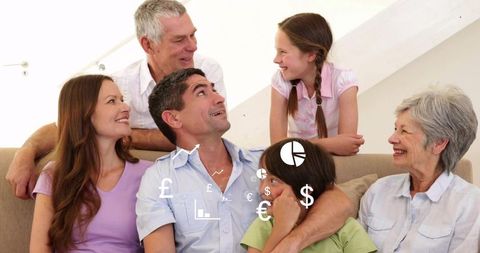 Smiling multigenerational family planning finances together on couch with money icons