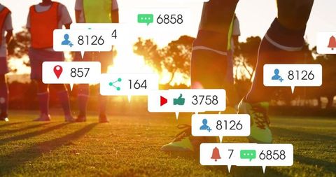 Soccer players bracing on sunlit field with neon cleats and social media overlays