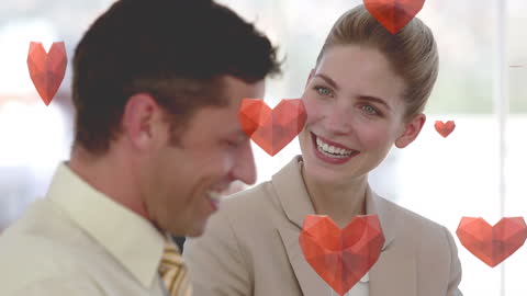 Couple in Business Attire with Hearts Symbolizing Love and Relationships