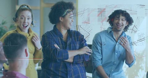 Colleagues Laughing in Modern Office with Data Interface - Download Free Stock Images Pikwizard.com