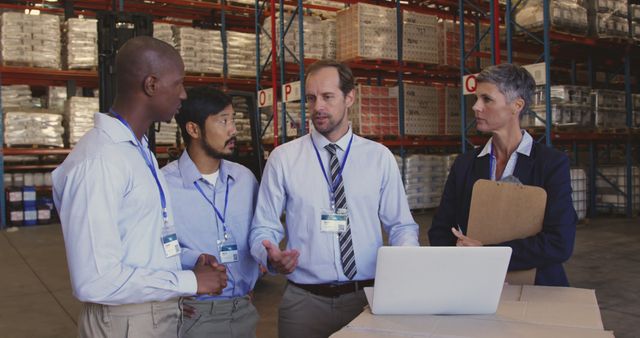 Manager Discussing Work Strategy with Warehouse Team - Download Free Stock Images Pikwizard.com