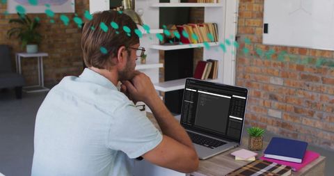 Businessman analyzing data on laptop with internet connections concept