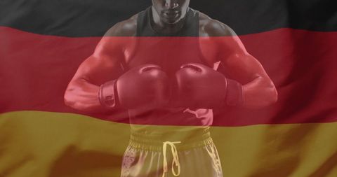 Boxer with german flag overlay represents strength and patriotism