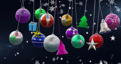 Vibrant Hanging Christmas Ornaments with Falling Snowflakes