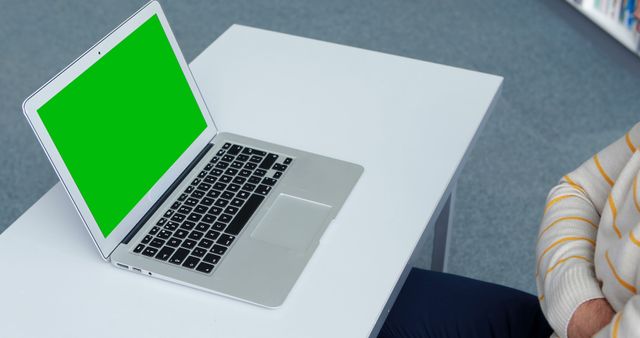 Open Laptop with Green Screen on White Table in Modern Office - Download Free Stock Images Pikwizard.com