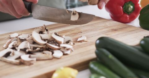 Chopping Mushrooms for a Fresh and Healthy Meal - Download Free Stock Images Pikwizard.com