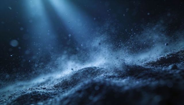 Drifting blue dust and granular texture on backlit surface with bokeh highlights