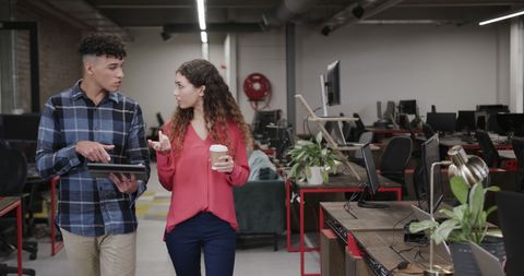 Casual Business Colleagues Discussing in Modern Office