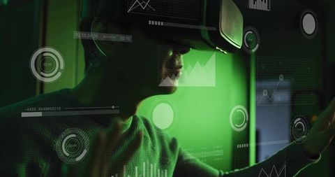 Mature korean man wearing vr headset interacting with green holographic hud and data charts