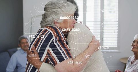Senior women embracing with healthcare overlay showing remote monitoring and care
