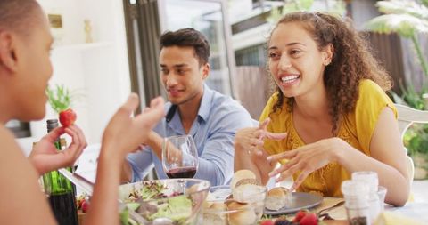 Group of Friends Enjoying Patio Dinner Gathering