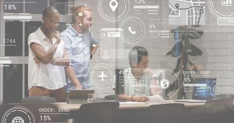 Team discussing data-driven strategy around laptop and documents with hud overlays