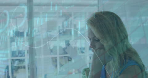 Thoughtful Woman Analyzing Data with Graphs Overlaid