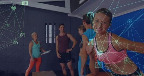 Smiling fitness group thumb up with digital circuit overlay