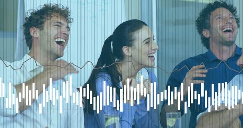 Happy business colleagues sharing laughter with technology overlay