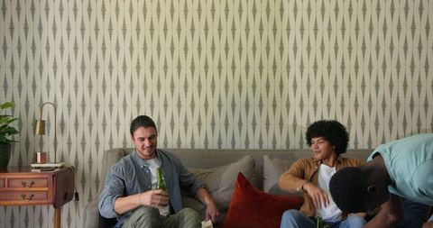 Friends Enjoying Casual Get-Together with Drinks at Home