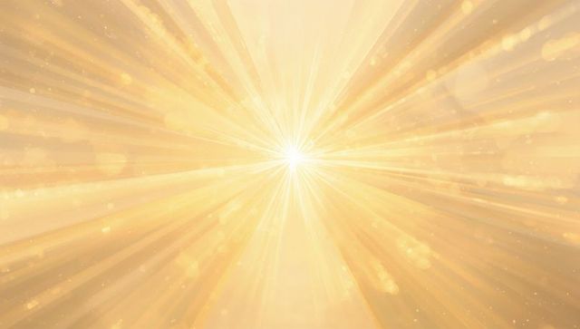 Radiating golden starburst emitting radial light rays and bokeh sparkles