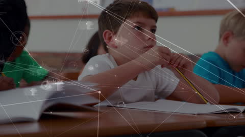 Boy Engaged in Modern Classroom with Networking Graphics