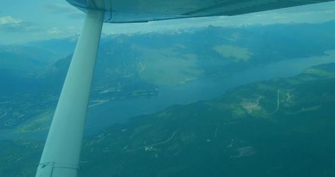 White Wing Strut Framing Mountain Valley Over Alpine Lake, Aerial Wilderness Scenery