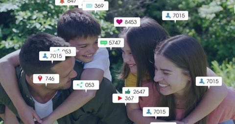 Smiling family giving piggyback rides in sunny park with social media notification bubbles