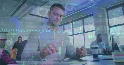 Caucasian man analyzing financial data on smartphone in office