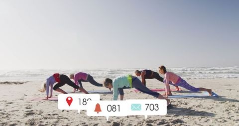 Women Performing Beach Yoga with Digital Interface Elements