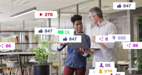 Coworkers Analyzing Social Media Data in Modern Office - Download Free Stock Images Pikwizard.com