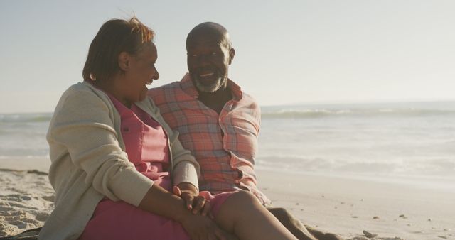 Senior African American Couple Relaxing on Beach During Sunset - Download Free Stock Images Pikwizard.com