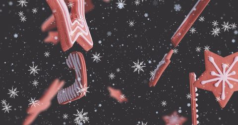 Floating christmas gingerbread cookies with falling snowflakes