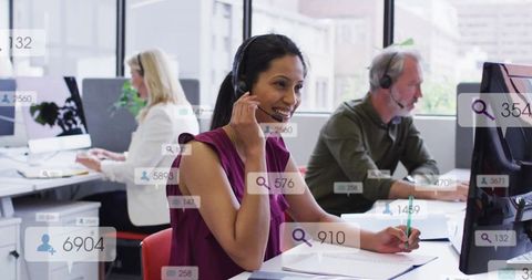 Businesswoman Engaging in Communication Amidst Digital Interface Icons