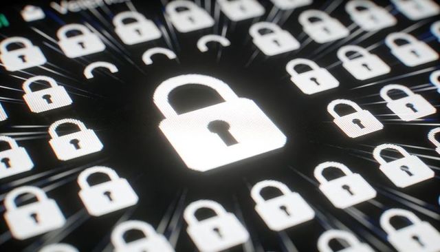 Glowing central padlock among repeating locks with streaks representing cybersecurity