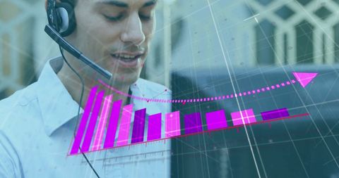 Businessman Using Headset with Virtual Financial Data Overlap