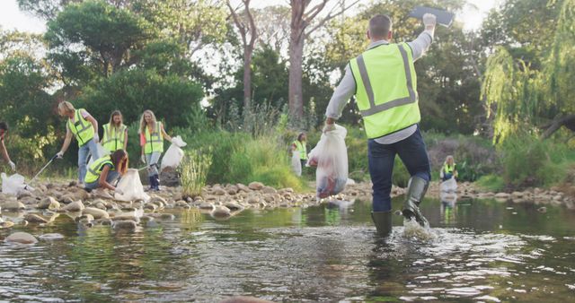 Dedicated Volunteers Cleaning River to Protect Environment - Download Free Stock Images Pikwizard.com