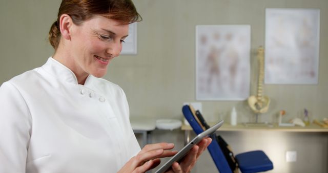 Healthcare Professional Using Digital Tablet in Modern Clinic - Download Free Stock Images Pikwizard.com