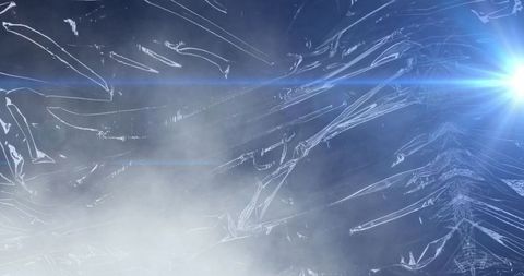 Abstract blue light beam on black shiny surface