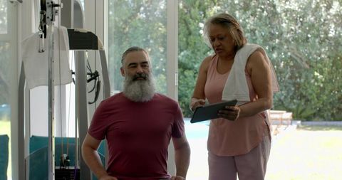 Senior Couple Exercising at Home: Embracing Health and Fitness