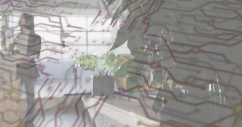 Biophilic office blending plant foliage with circuit overlay for tech collaboration