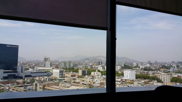 Cityscape View Through Office Windows on a Sunny Day - Download Free Stock Images Pikwizard.com