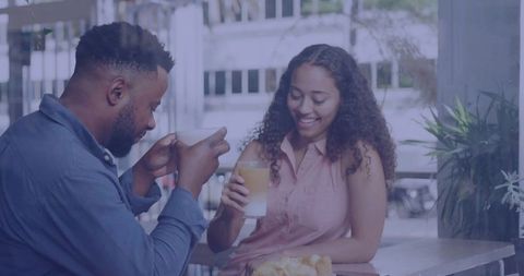 Friends Enjoying Coffee Together in Cozy Cafe Setting