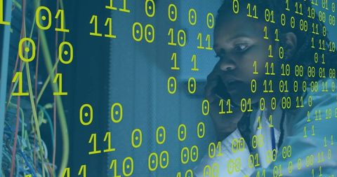 Technician Reviewing Network Cables with Binary Code Overlay - Download Free Stock Images Pikwizard.com