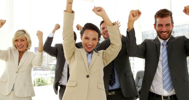 Successful Business Team Celebrating Achievement in Office - Download Free Stock Images Pikwizard.com