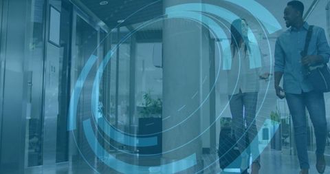 Coworkers Walking in Modern Office Corridor with Tech Overlay