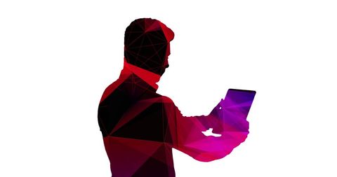 Silhouette of Man with Digital Tablet in Abstract Red Light